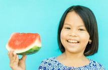 child eating watermelon 