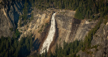 waterfall off the side of a mountain 