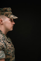 side profile of a Marine in camouflage 