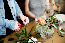 women arranging flowers 
