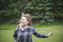 young woman running outdoors 