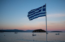 Greek Flag and bay view 