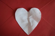 white heart on red envelope 
