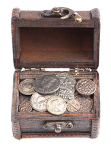 A treasure chest of Ancient Roman Coin Replicas Isolated on a White Background