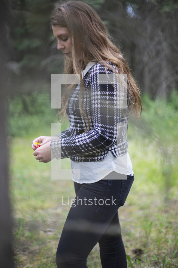 young woman walking outdoors 