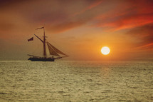 ship at sea at sunset 