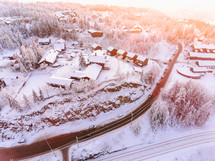 aerial view over a snowy mountain town 