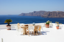 outdoor table on a rooftop balcony in Greece 
