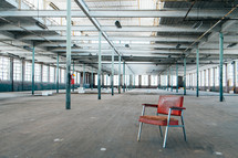chair in an empty warehouse 