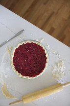 A cherry pie ready to be baked.