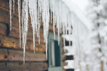 icicles hanging from a cabin 