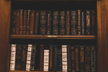 old books on a bookshelf 