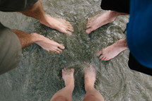 bare feet in shallow water 