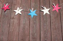 red, white, and blue paper stars 