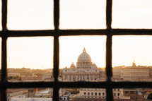 view of St Peter's Basilica though a window 