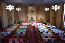 quilts on church pews 