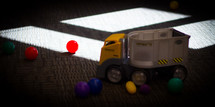 toy trucks and balls 