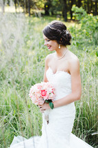 A bride holding a bouquet of flowers 