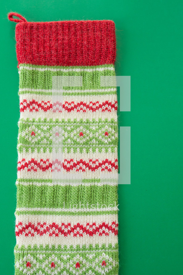 top of a knit Christmas stocking 