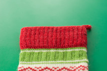 top of a knit Christmas stocking 