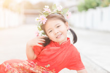 smiling girl in traditional Chinese dress 