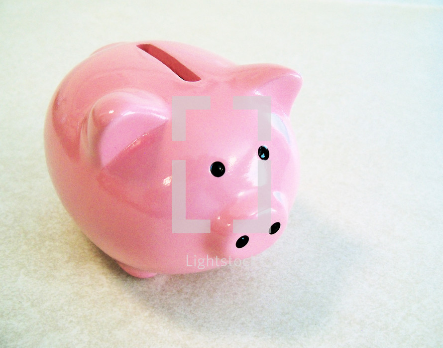 A bright pink colored piggy bank for saving coins for small children and adults who want to earn money on their savings, allowance money and earn interest. The Piggy bank is a universal symbol for savings and saving money so just wanted to share this fun image for use on blogs, websites, magazines, devotionals or any articles or advertisements that could use this image that everyone can identify with so easily. 