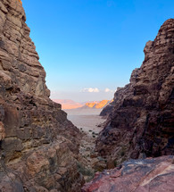 Glimpse between the mountains of the Wadi Rum desert in Jordan.
