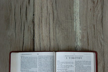 a Bible opened to 1 Timothy 