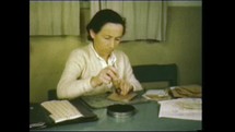 Menashe Heights, Israel, Circa 1940's. Color footage of office workers handling papers