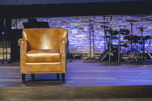Tan leather seat on a church stage.