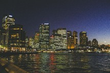 City skyline at night by the bay.