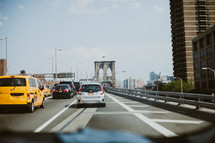 traffic going across the Brooklyn Bridge 