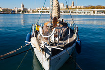 a sailboat docked in a marina 