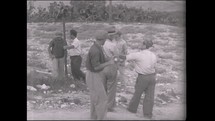 ISRAEL, July 1937. Jewish pioneers establishing a new kibbutz in northren Israel as part of the Tower and Stockade era.