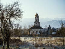 old stone country church in winter 