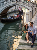a couple traveling in Venice 