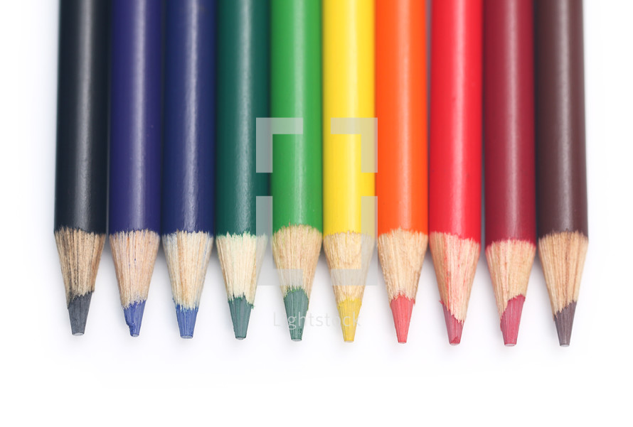 border of colored pencils in rainbow colors