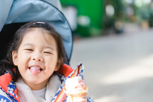 a little girl eating ice cream 