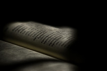 sunlight shinning on the pages of a Hebrew Bible