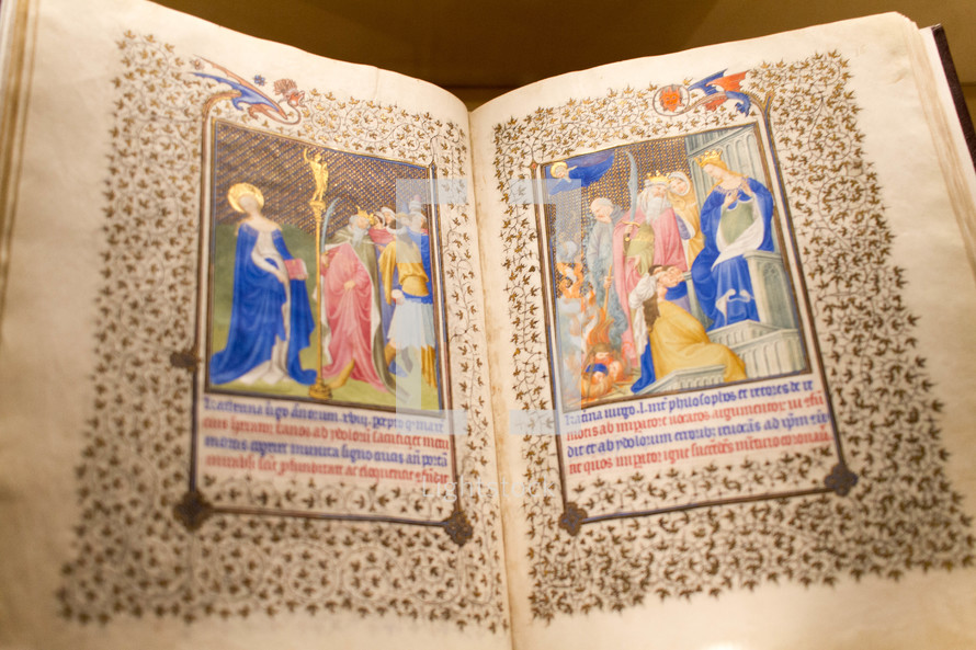 colorful artwork on the pages of an old Bible 