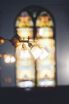 lights and stained glass window