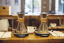 Pour over coffee makers at a church coffee shop.