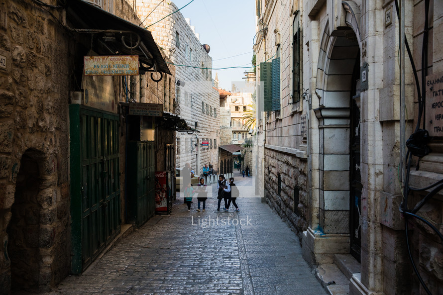 kids on a narrow street in Jerusalem 
