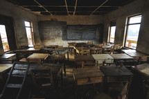 Desks in an empty school house in Africa