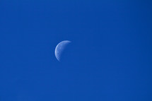 Half Moon in the Deep Blue Sky
