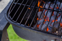 hot coals on a grill 
