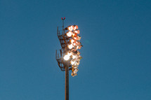 Pole of stadium lights.