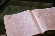 An open Bible. 