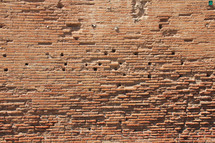 Weathered brick wall.
