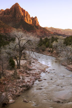 red rock mountain and river